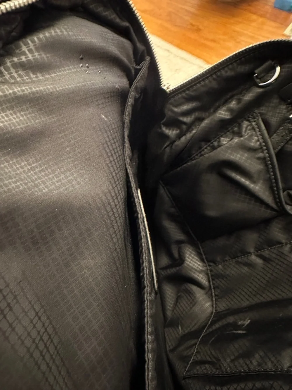 Tumi leather trimmed